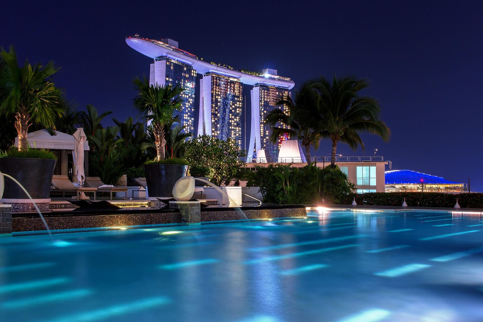 Marina Bay Sands and skyline reflected in an infinity pool at night, Singapore